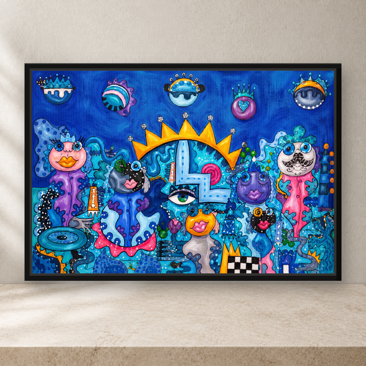 Blue whimsical framed canvas wall art with crowned surreal characters, turquoise accents, golden crowns, and colorful pop art details